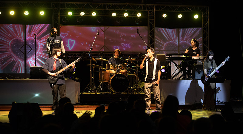Students performing on stage at Emmaus Catholic College Kemps Creek