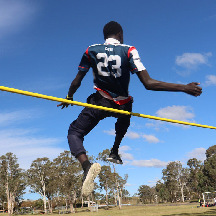 Emmaus Catholic College Kemps Creek student doing the high jump